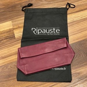 New Ripauste carry clutch with magnetic close in dark berry magenta